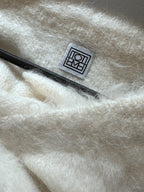 Toteme Oversized alpaca and wool-blend bouclé sweater